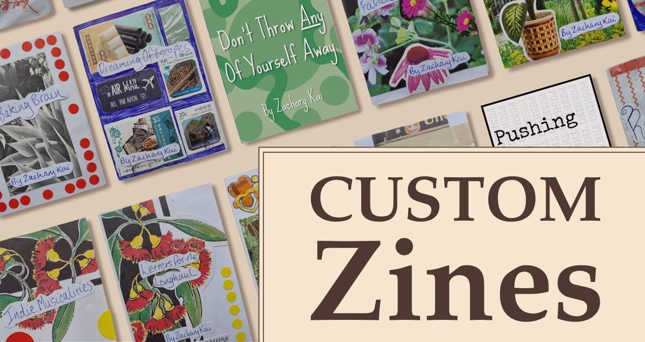 A flatlay showing handmade and digitally-typeset zines.